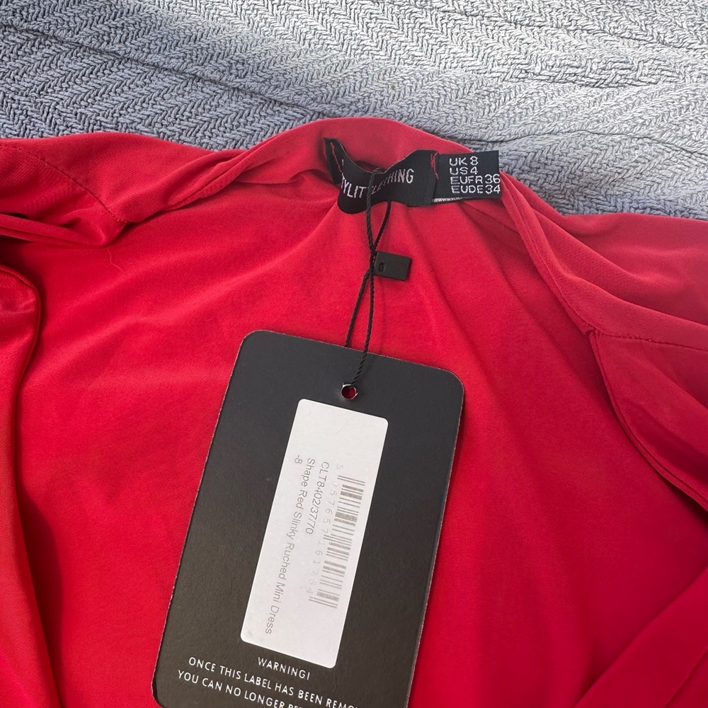 Red slinky rushed mini dress